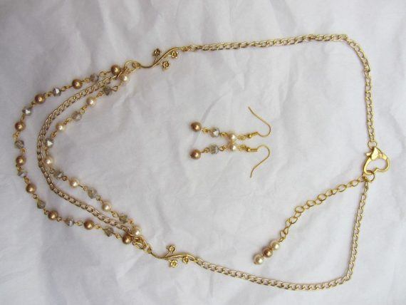 Gold plated 3 tier shell pearl and crystal necklace and earring set