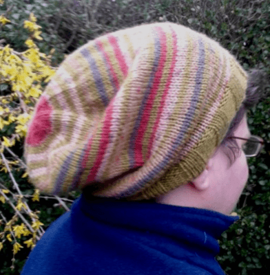 Handknitted green, brown and red slouch hat