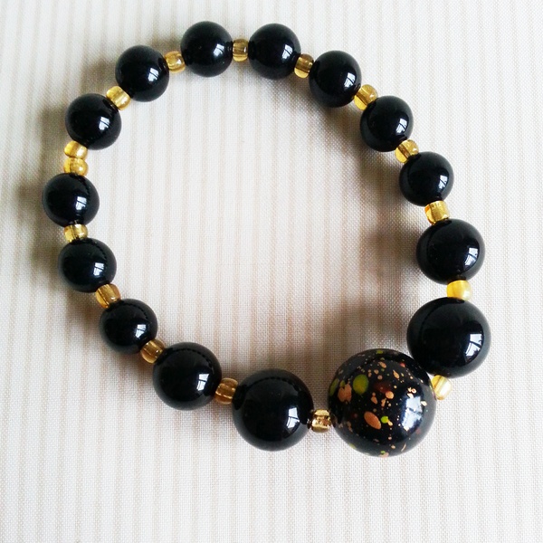 Black and Amber coloured elasticated bead bracelet - Conscious Crafties