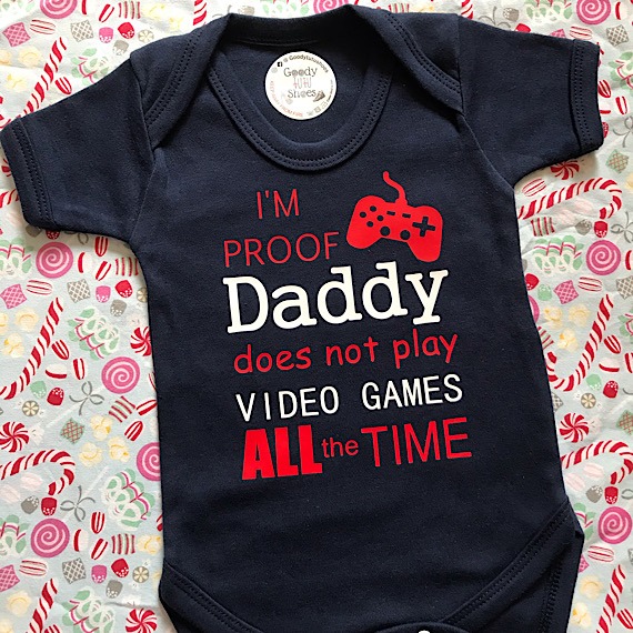 i'm proof daddy play games  colour writing vest up to 18 months sizes available 